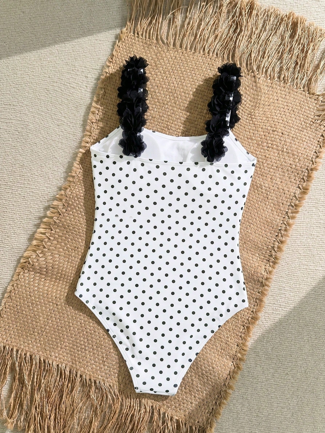 Tween girls one-piece swimsuit with 3D floral applique details, plant graphics, scoop neck, fitted shape, and lined body for beach and vacation wear.