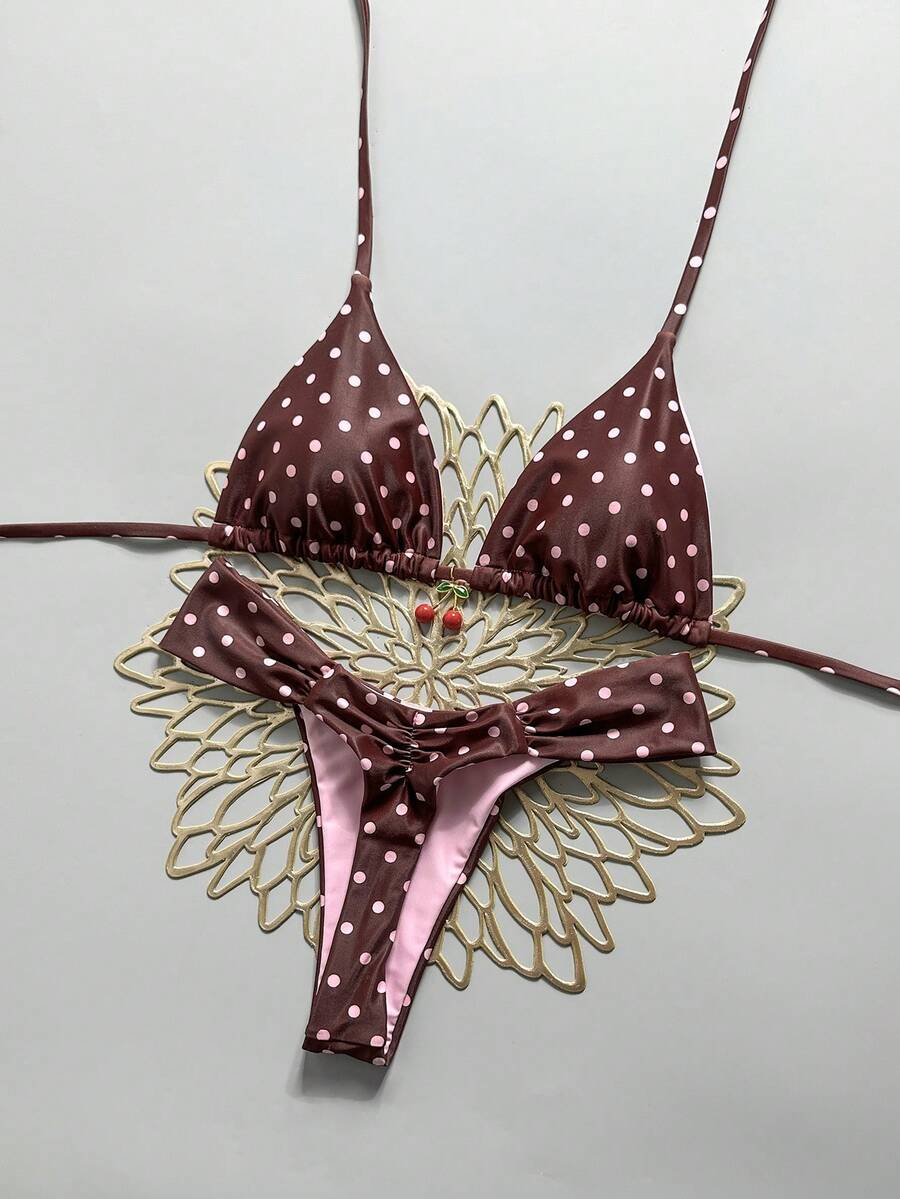 Women's 2-piece triangle cup bikini set in solid color featuring woven pearl shell decoration, halter neckline, and high-waist side-tie ruched bottoms.