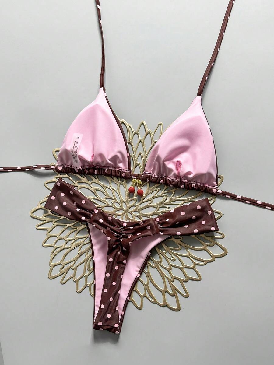 Women's 2-piece triangle cup bikini set in solid color featuring woven pearl shell decoration, halter neckline, and high-waist side-tie ruched bottoms.