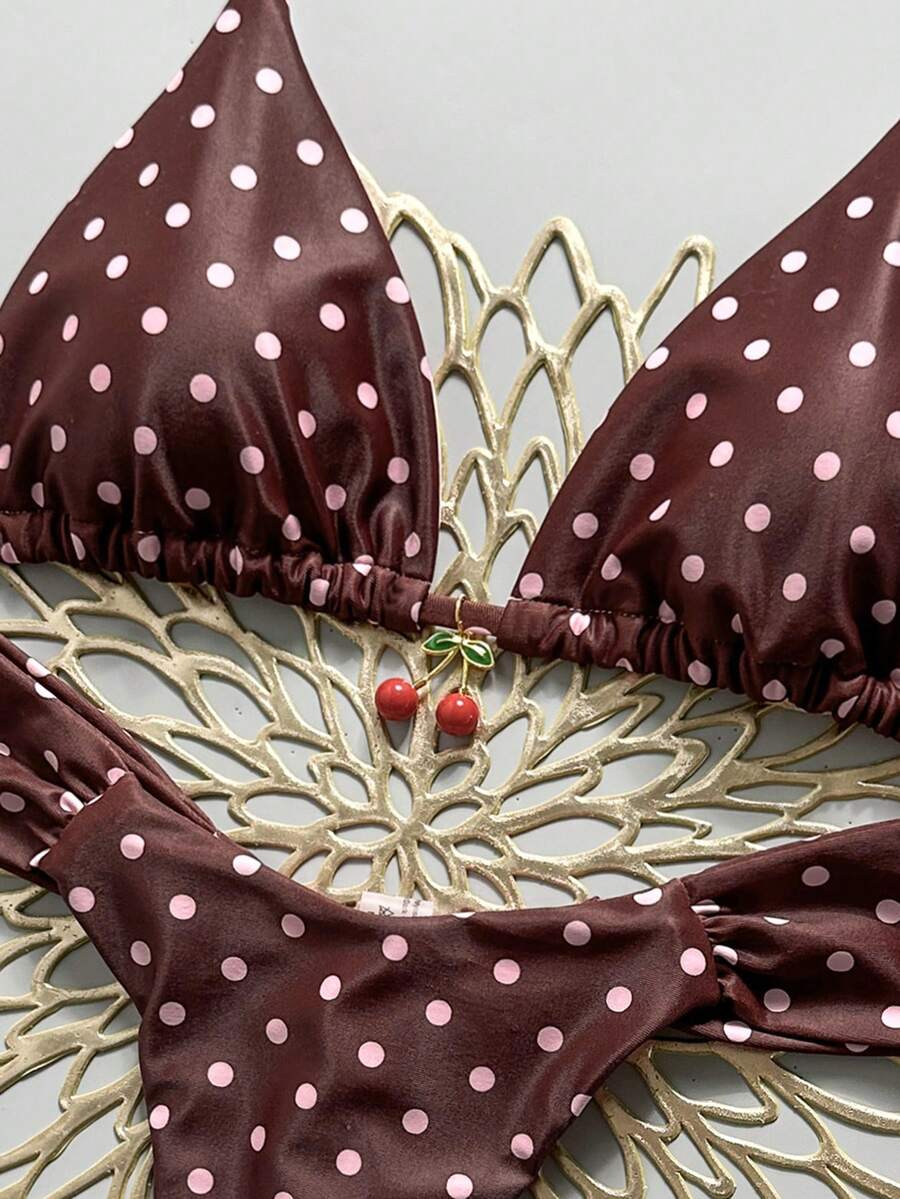 Women's 2-piece triangle cup bikini set in solid color featuring woven pearl shell decoration, halter neckline, and high-waist side-tie ruched bottoms.
