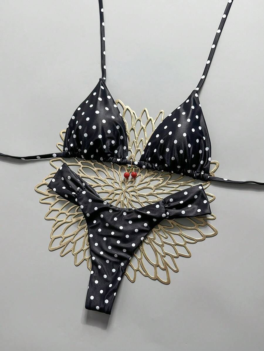 Women's 2-piece triangle cup bikini set in solid color featuring woven pearl shell decoration, halter neckline, and high-waist side-tie ruched bottoms.