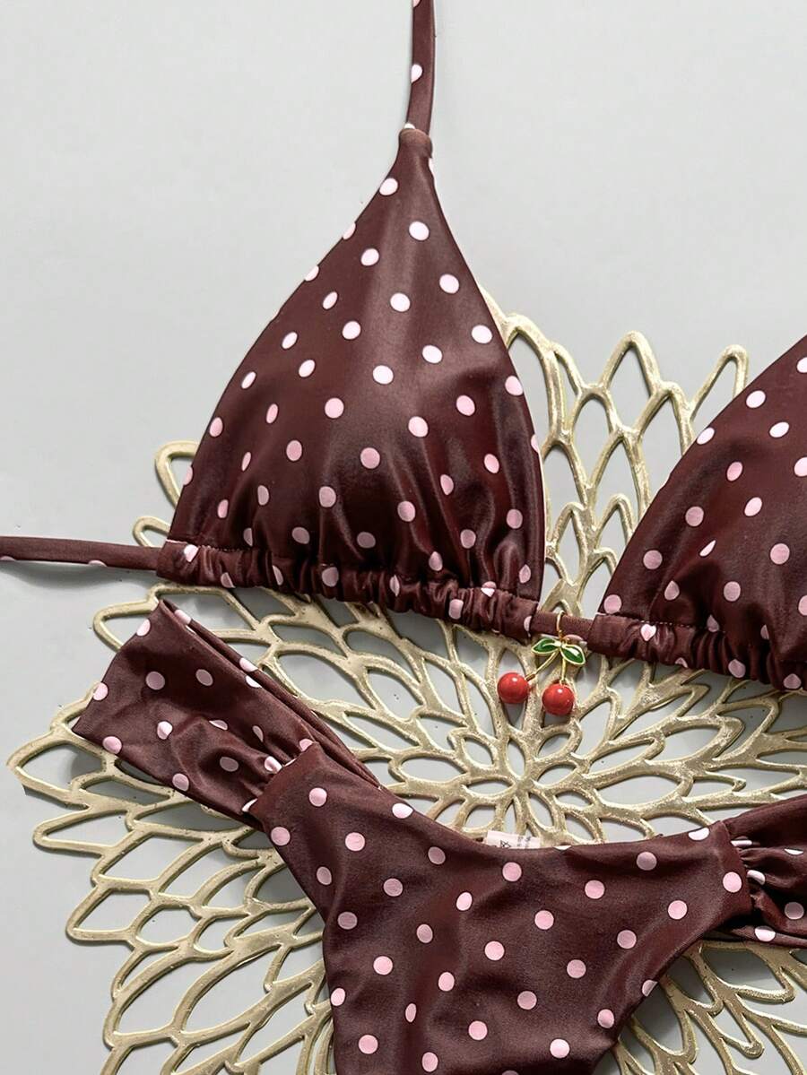Women's 2-piece triangle cup bikini set in solid color featuring woven pearl shell decoration, halter neckline, and high-waist side-tie ruched bottoms.