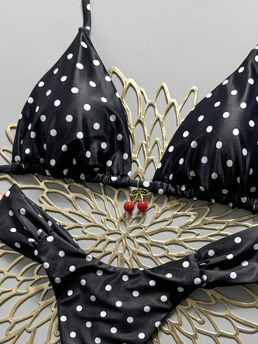 Women's 2-piece triangle cup bikini set in solid color featuring woven pearl shell decoration, halter neckline, and high-waist side-tie ruched bottoms.