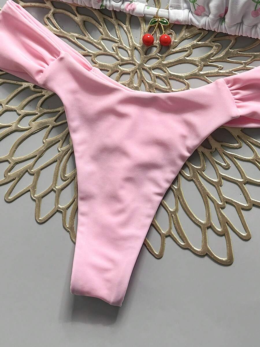 Women's 2-piece triangle cup bikini set in solid color featuring woven pearl shell decoration, halter neckline, and high-waist side-tie ruched bottoms.