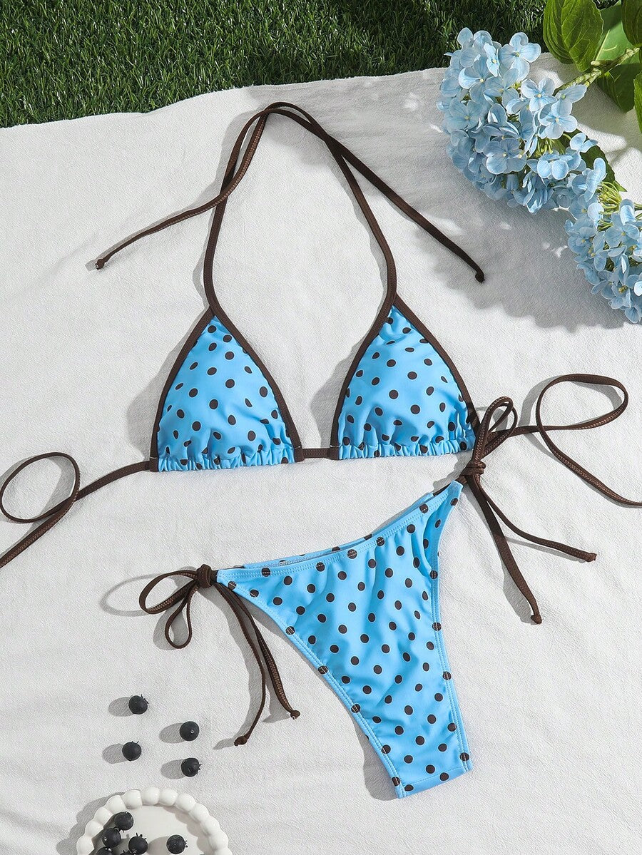 Women's tropical print two-piece halter bikini set featuring wireless triangle cups with tie-back detail and high-waist bikini bottoms.