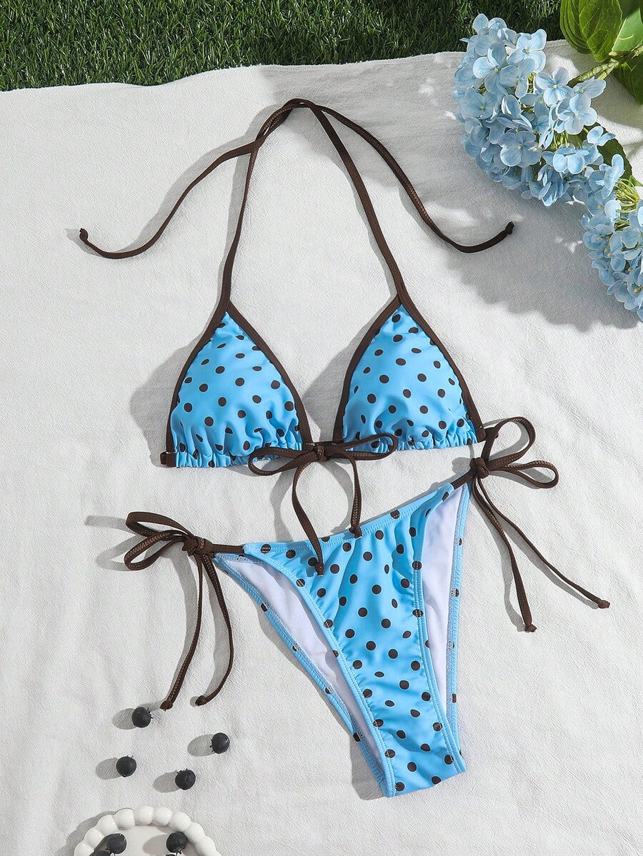 Women's tropical print two-piece halter bikini set featuring wireless triangle cups with tie-back detail and high-waist bikini bottoms.