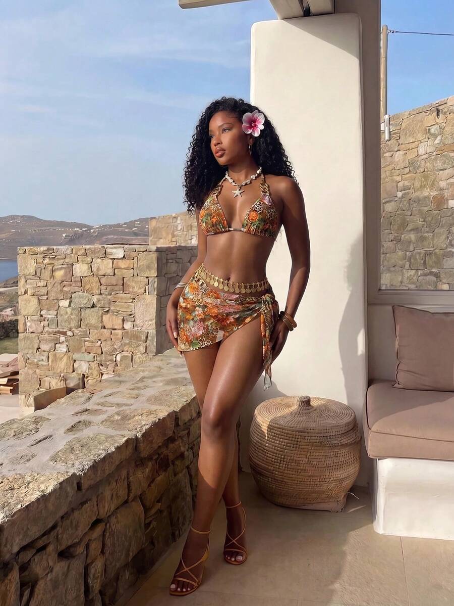 Multicolor 3-piece women's swimwear set featuring a floral plant print halter triangle bikini top with backless tie detail and matching mesh cover-up skirt.