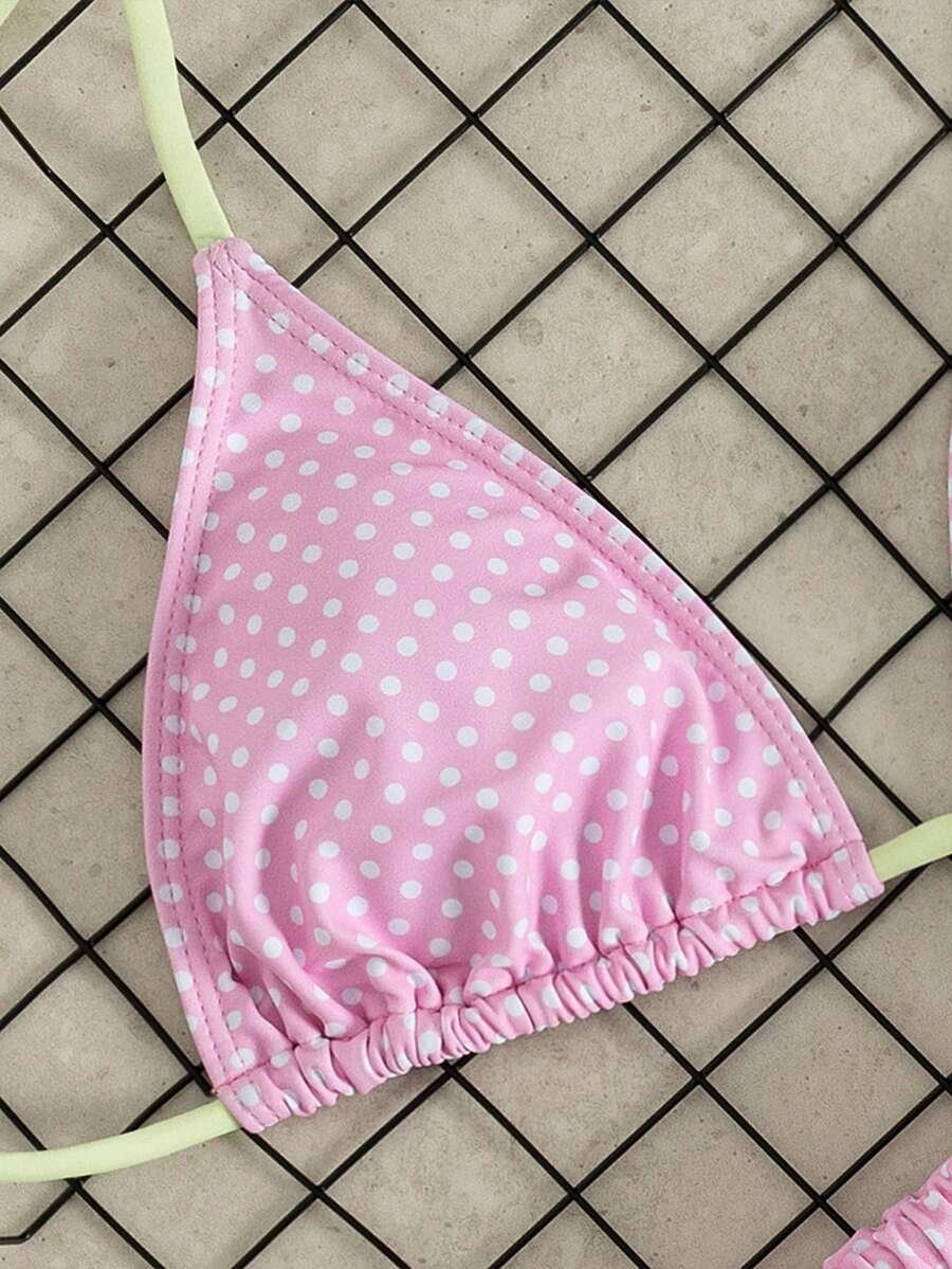 Women's striped halter two-piece swimsuit featuring a lace-up triangle top with removable padding and high-cut low-waist bikini bottoms.
