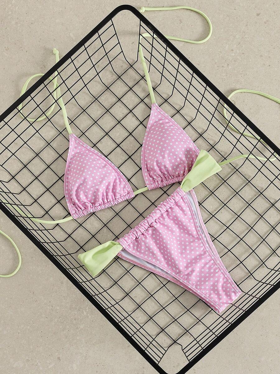 Women's striped halter two-piece swimsuit featuring a lace-up triangle top with removable padding and high-cut low-waist bikini bottoms.