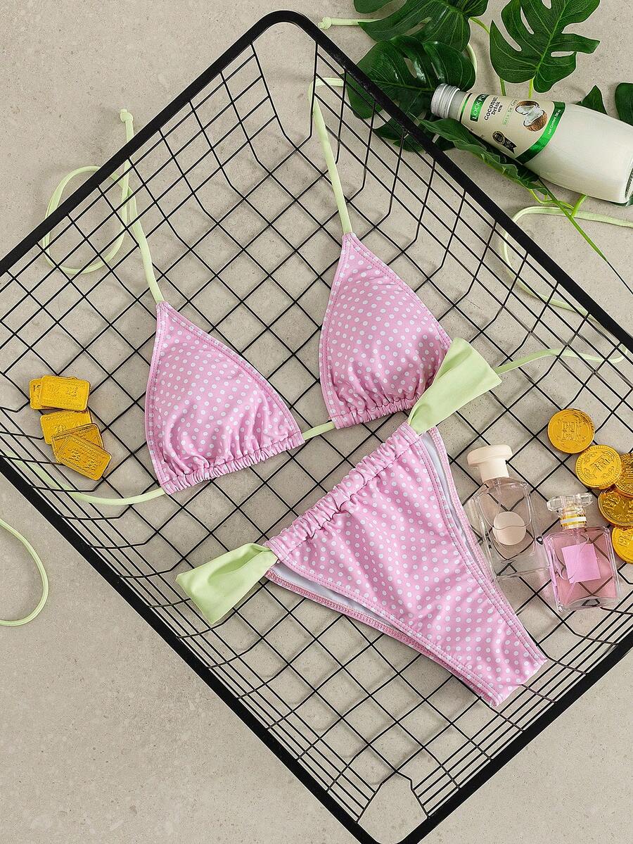 Women's striped halter two-piece swimsuit featuring a lace-up triangle top with removable padding and high-cut low-waist bikini bottoms.