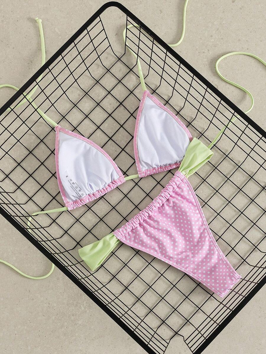 Women's striped halter two-piece swimsuit featuring a lace-up triangle top with removable padding and high-cut low-waist bikini bottoms.