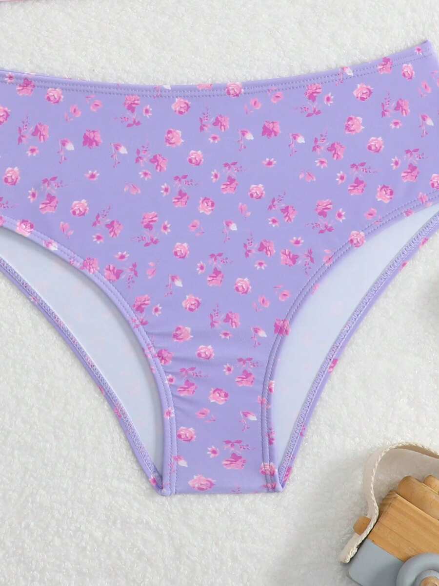 Tween girls multicolor striped 2-piece bikini set with spaghetti strap top, twist detail, and short high-waist or mid-waist swim bottoms for beach and pool wear.