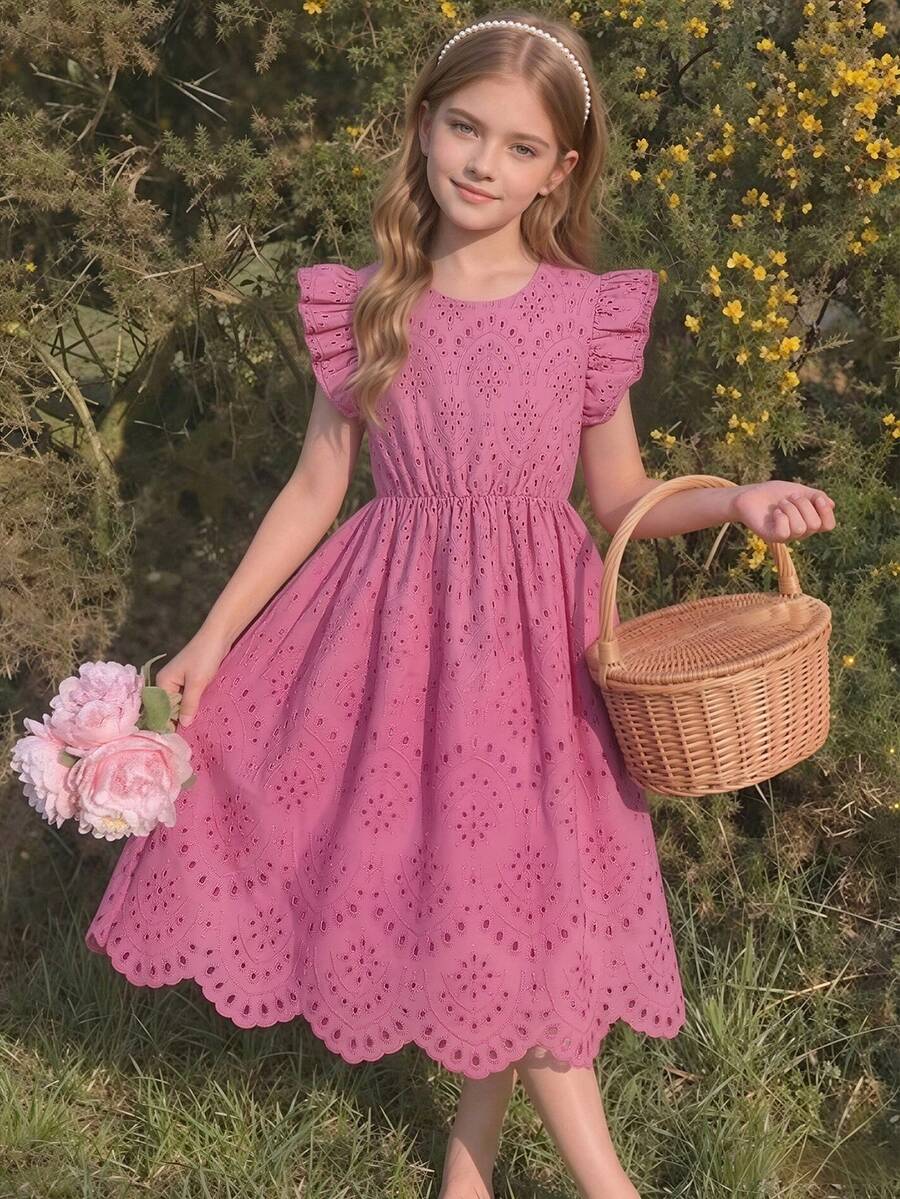 Tween girls blue short smock dress featuring flounce short sleeves, high waist flared hem, round neck, and front bow detail.