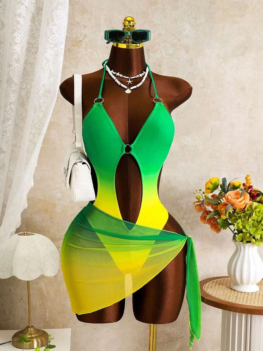 Women's green ombre digital print halter backless one-piece swimsuit paired with a matching sheer gradient mesh skirt.