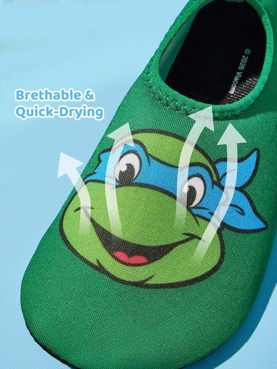 Girls cartoon pattern non-slip water shoes with slip-on closure and durable TPR outsole for beach and outdoor sports.
