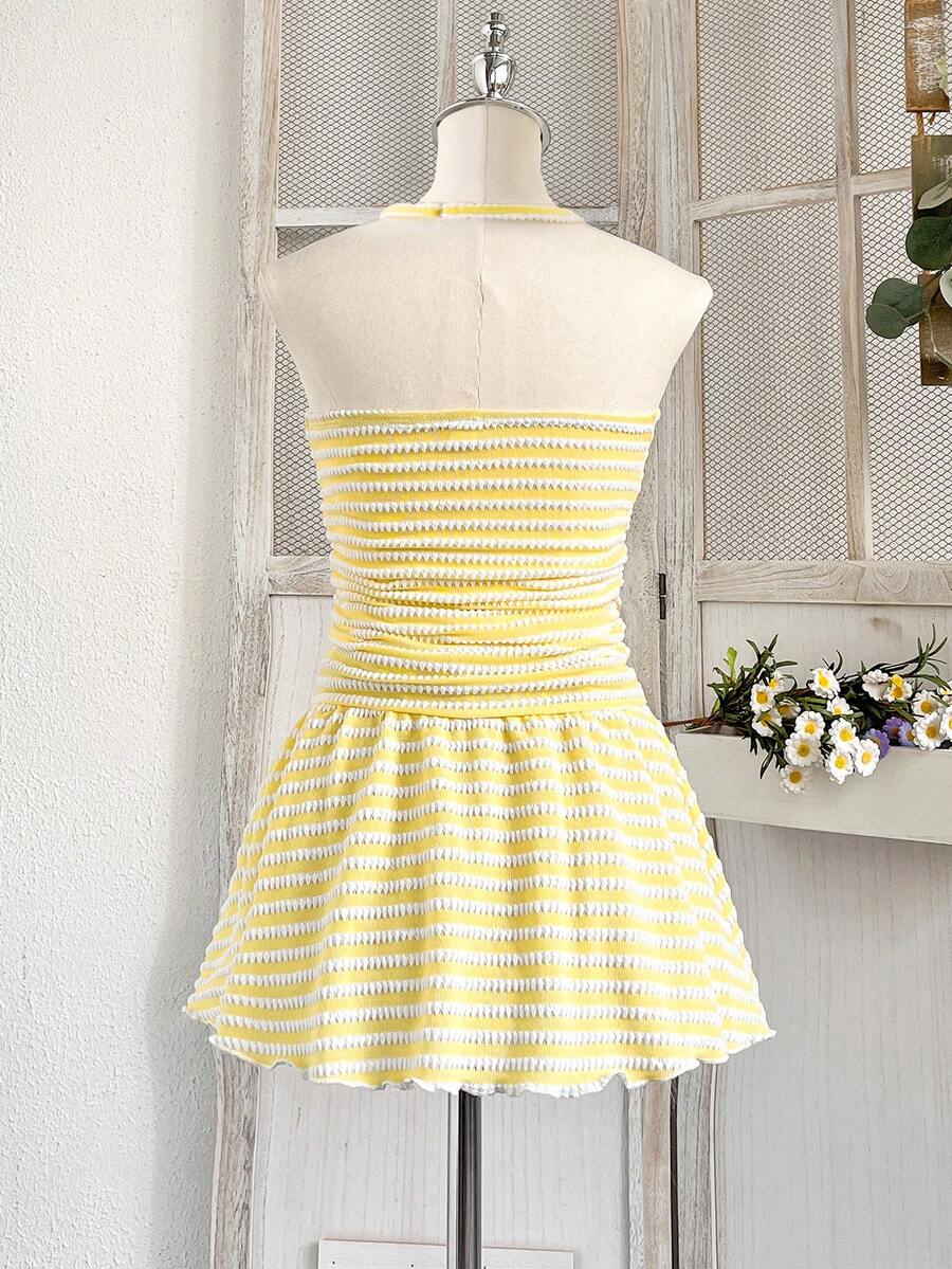 Tween girls apricot sleeveless halter mini dress with textured starfish and shell decor, shirred tiered layer, high waist, and flounce hem.