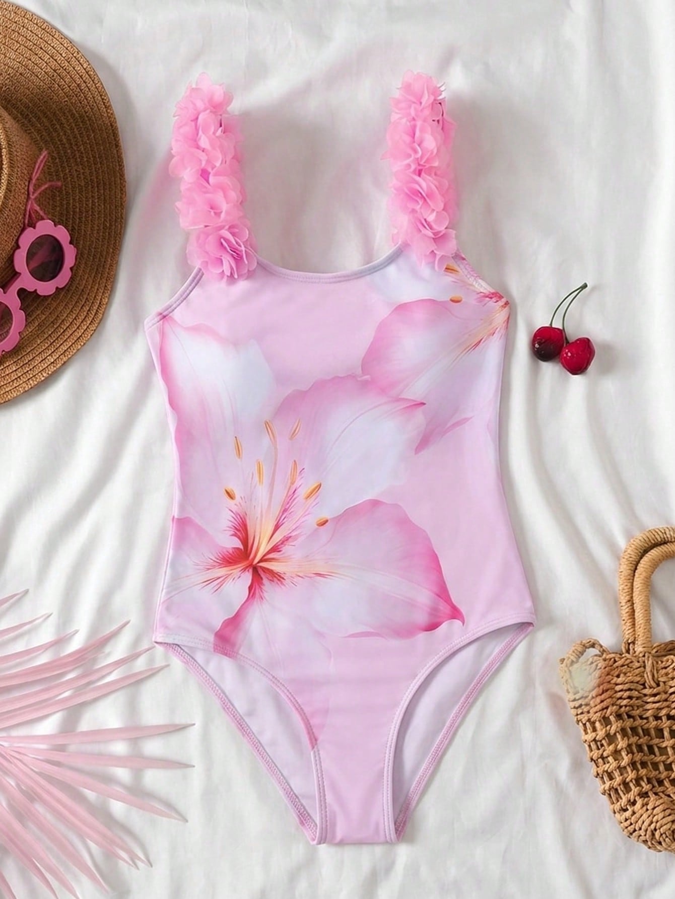 Tween girls one-piece swimsuit with 3D floral applique details, plant graphics, scoop neck, fitted shape, and lined body for beach and vacation wear.