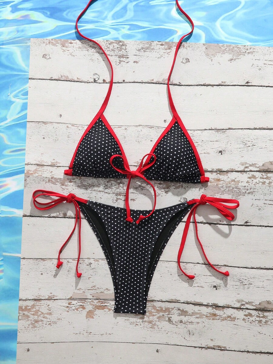 Women's tropical print two-piece halter bikini set featuring wireless triangle cups with tie-back detail and high-waist bikini bottoms.