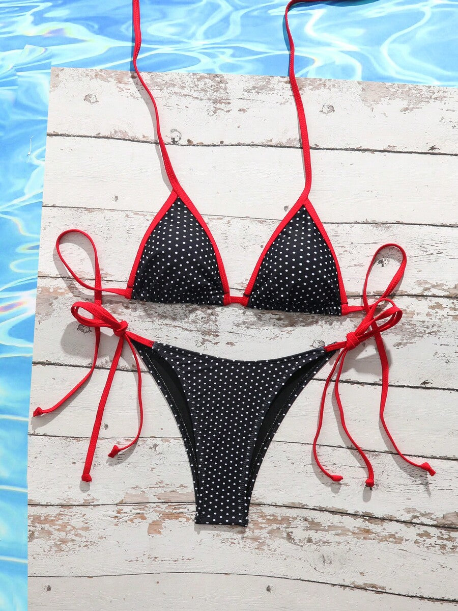 Women's tropical print two-piece halter bikini set featuring wireless triangle cups with tie-back detail and high-waist bikini bottoms.