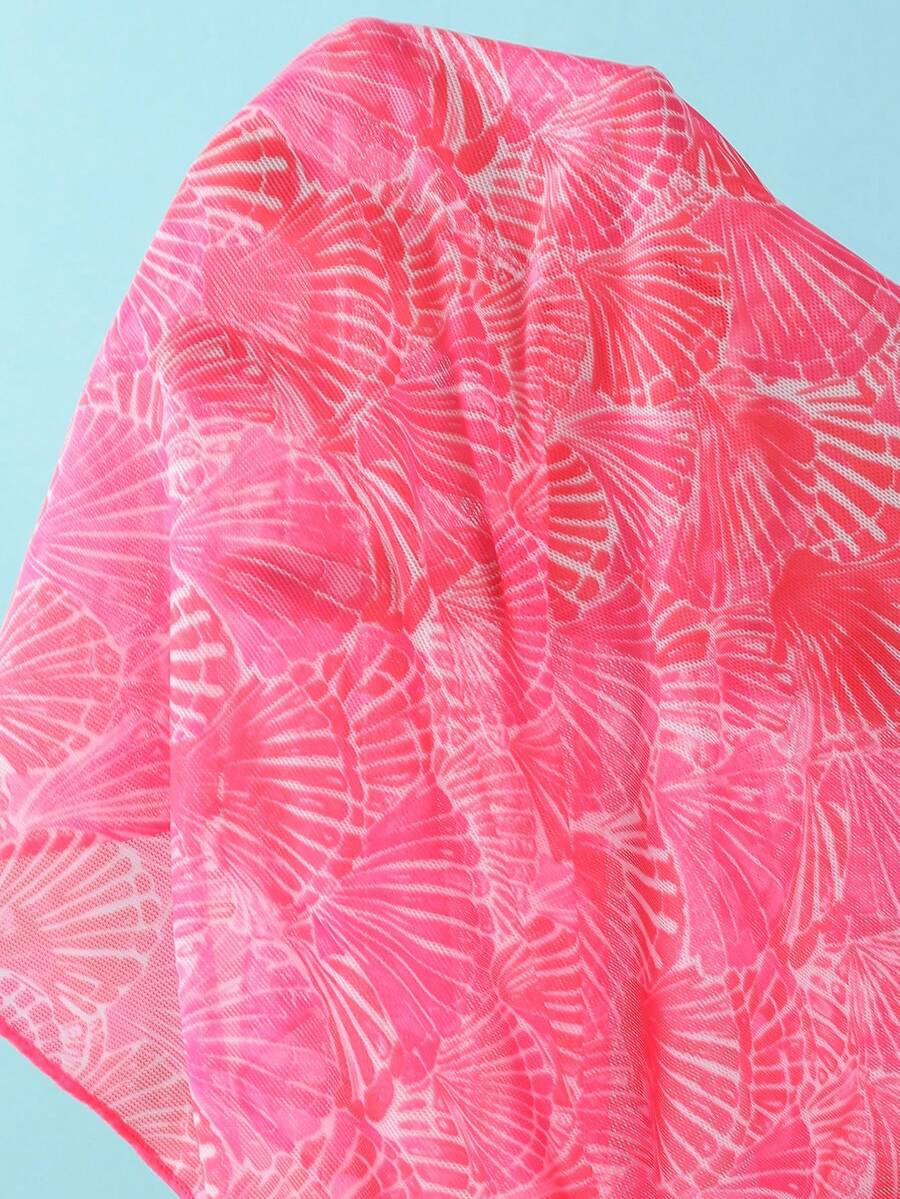 Women's 3-piece blue tropical shell print bikini set featuring a halter bralette top, low-waist tie-side bottom, and a matching sheer mesh cover-up skirt.