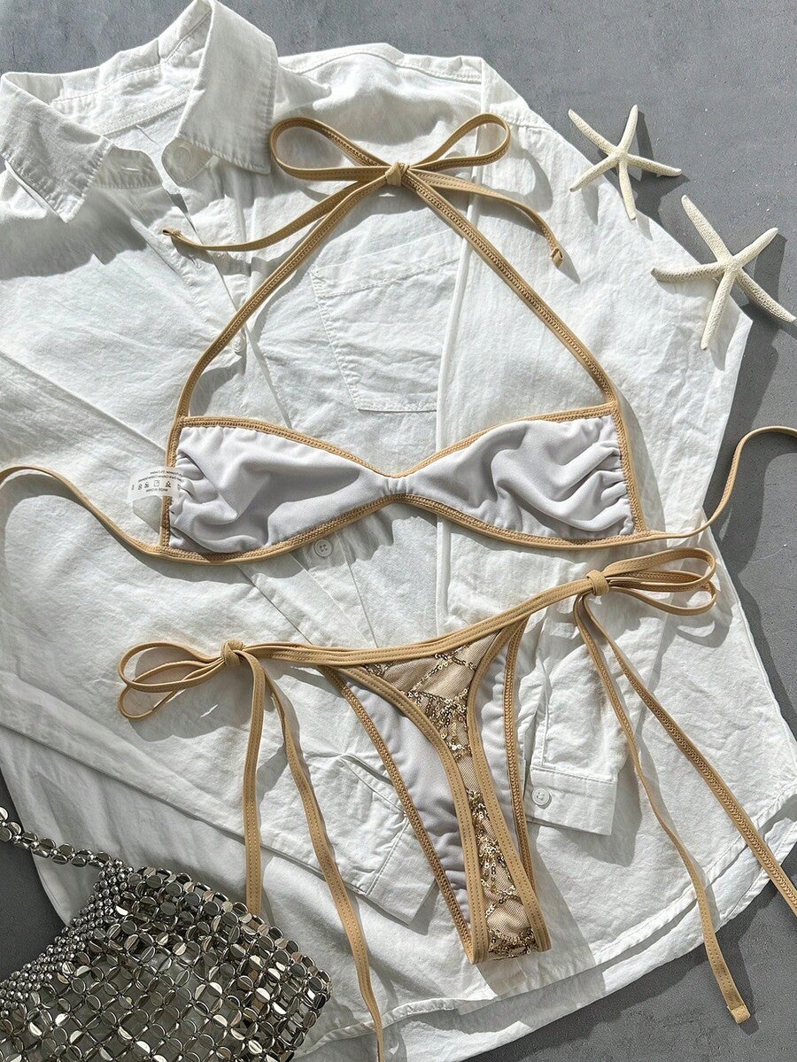 Apricot 2-piece sequin textured halter bikini set featuring a wireless top with lace-up backless ties and matching low-waist side-tie thong bottoms.
