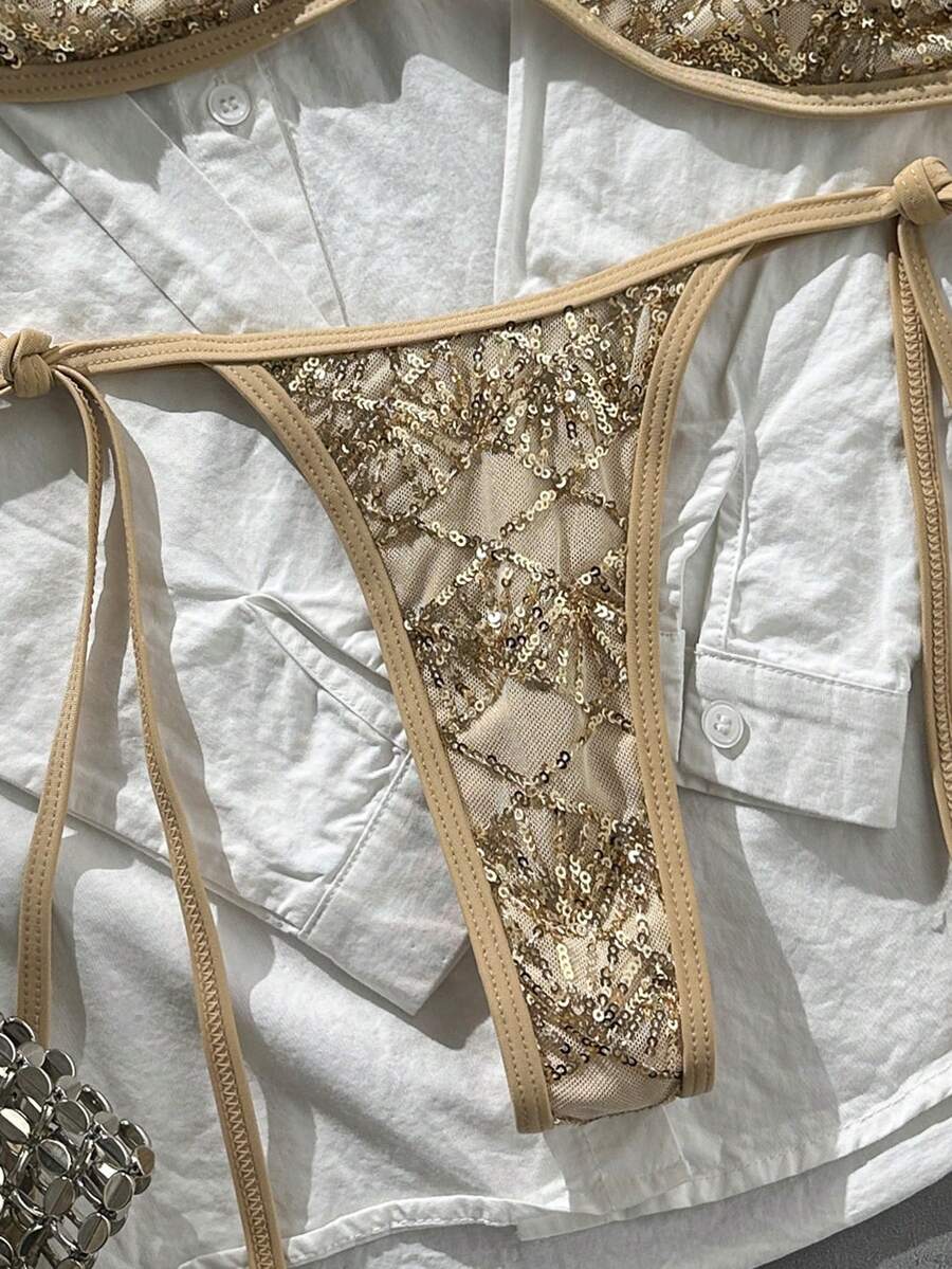 Apricot 2-piece sequin textured halter bikini set featuring a wireless top with lace-up backless ties and matching low-waist side-tie thong bottoms.