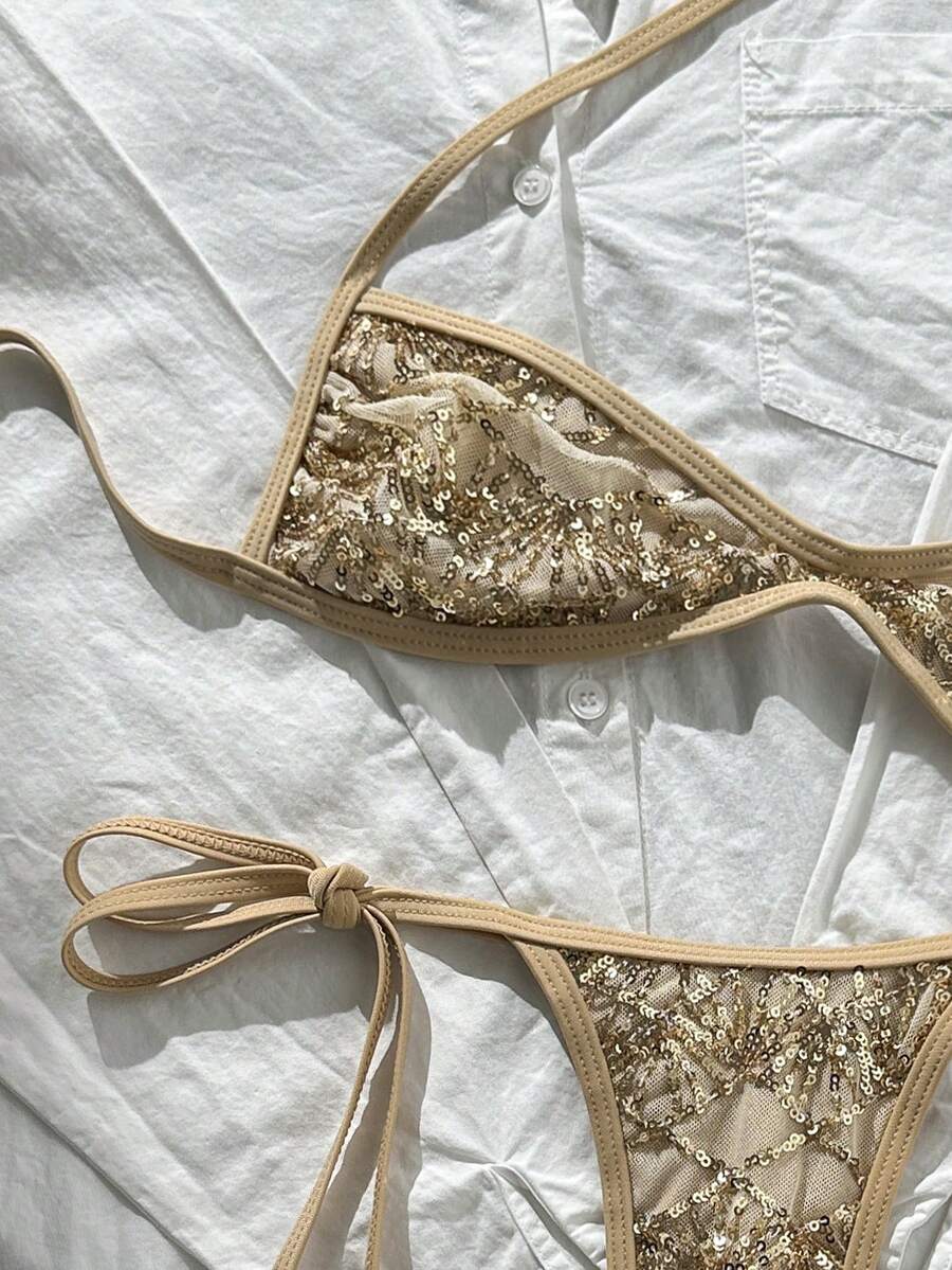 Apricot 2-piece sequin textured halter bikini set featuring a wireless top with lace-up backless ties and matching low-waist side-tie thong bottoms.