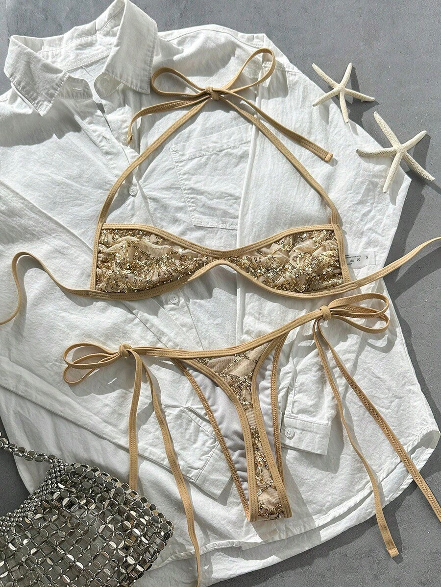 Apricot 2-piece sequin textured halter bikini set featuring a wireless top with lace-up backless ties and matching low-waist side-tie thong bottoms.