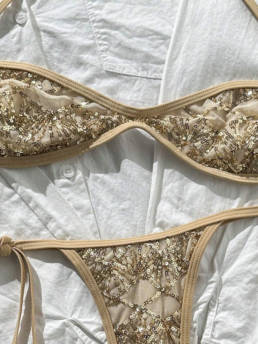 Apricot 2-piece sequin textured halter bikini set featuring a wireless top with lace-up backless ties and matching low-waist side-tie thong bottoms.