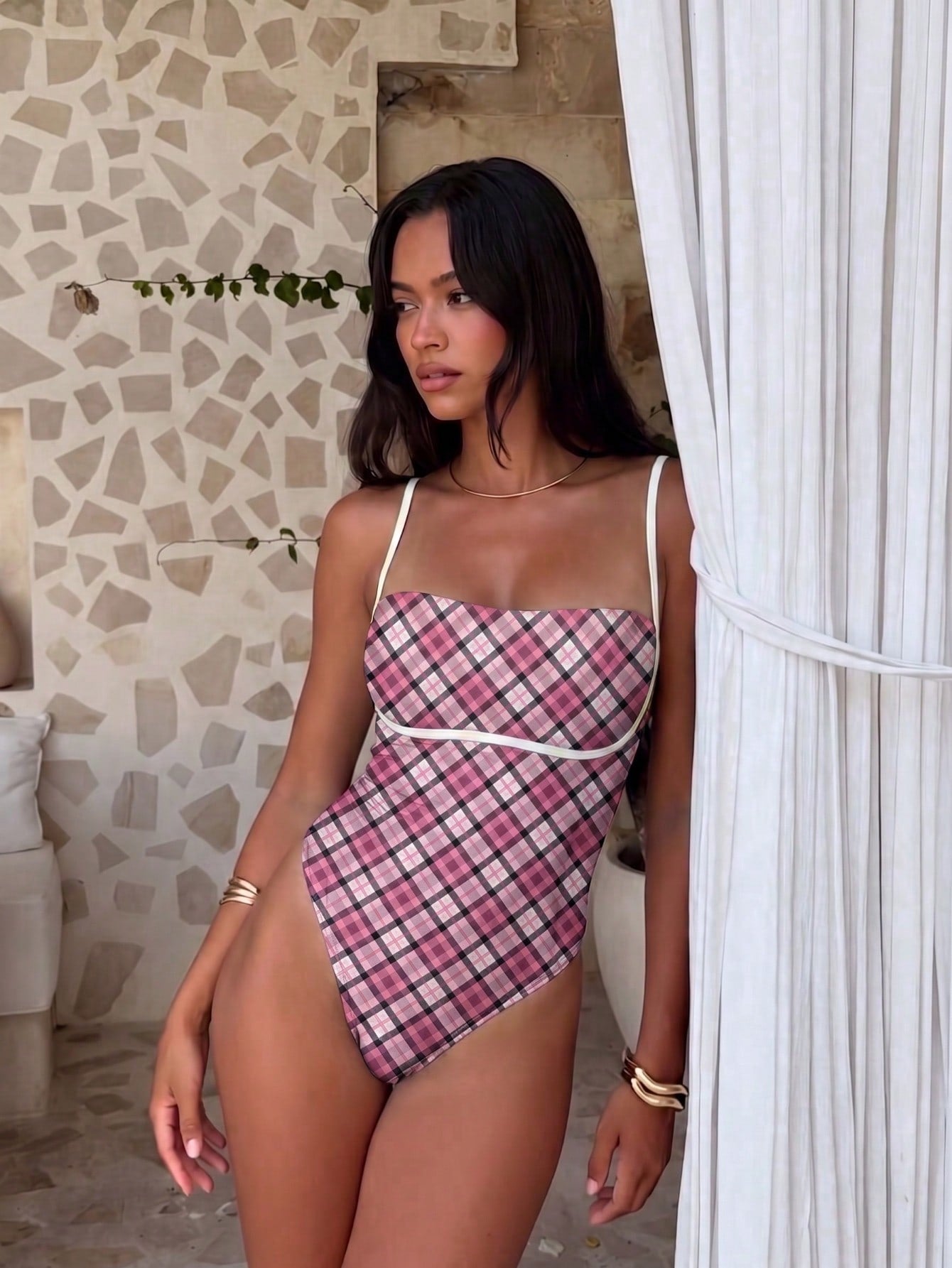 Black colorblock women's one-piece swimsuit with spaghetti straps and high stretch fabric.