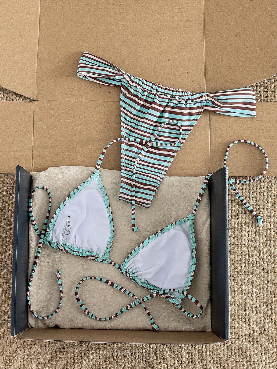 Women's striped halter two-piece swimsuit featuring a lace-up triangle top with removable padding and high-cut low-waist bikini bottoms.