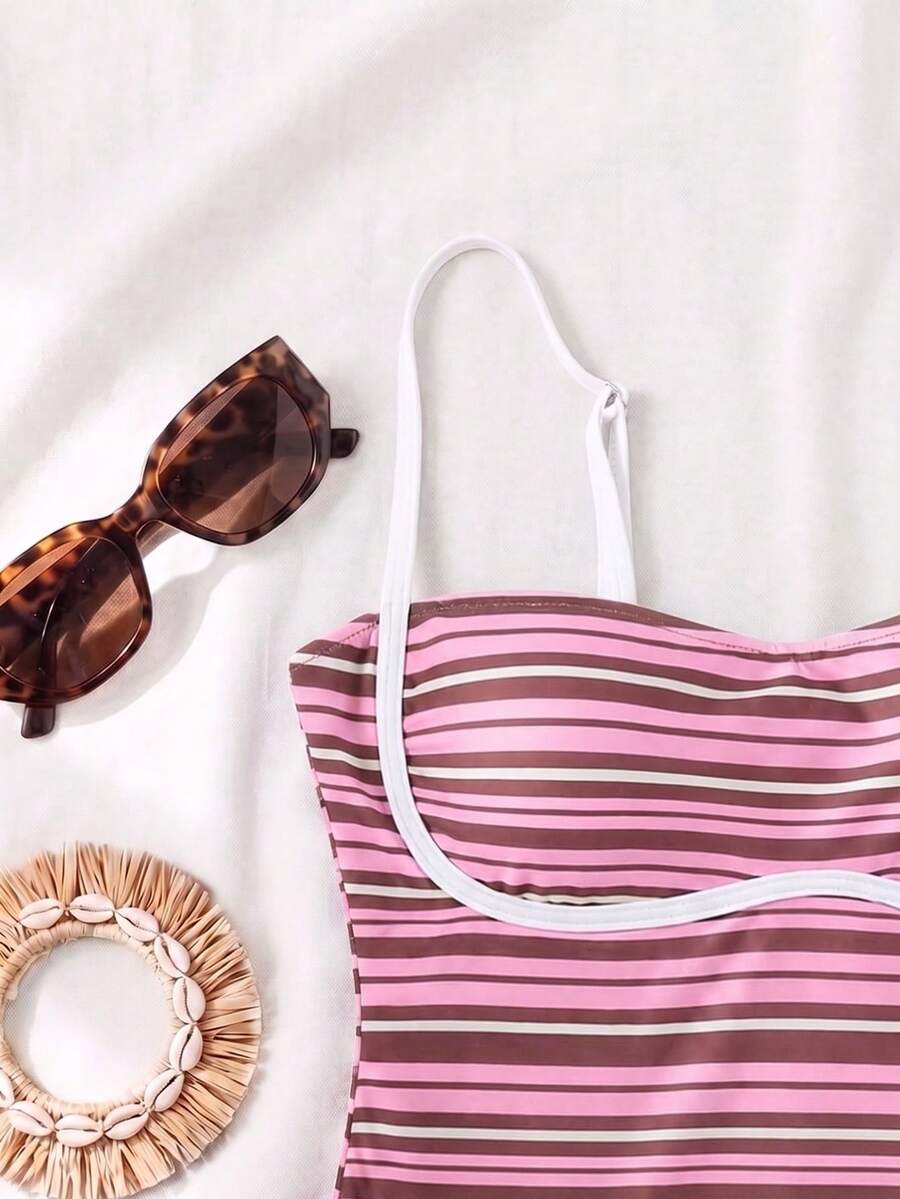 Black colorblock women's one-piece swimsuit with spaghetti straps and high stretch fabric.