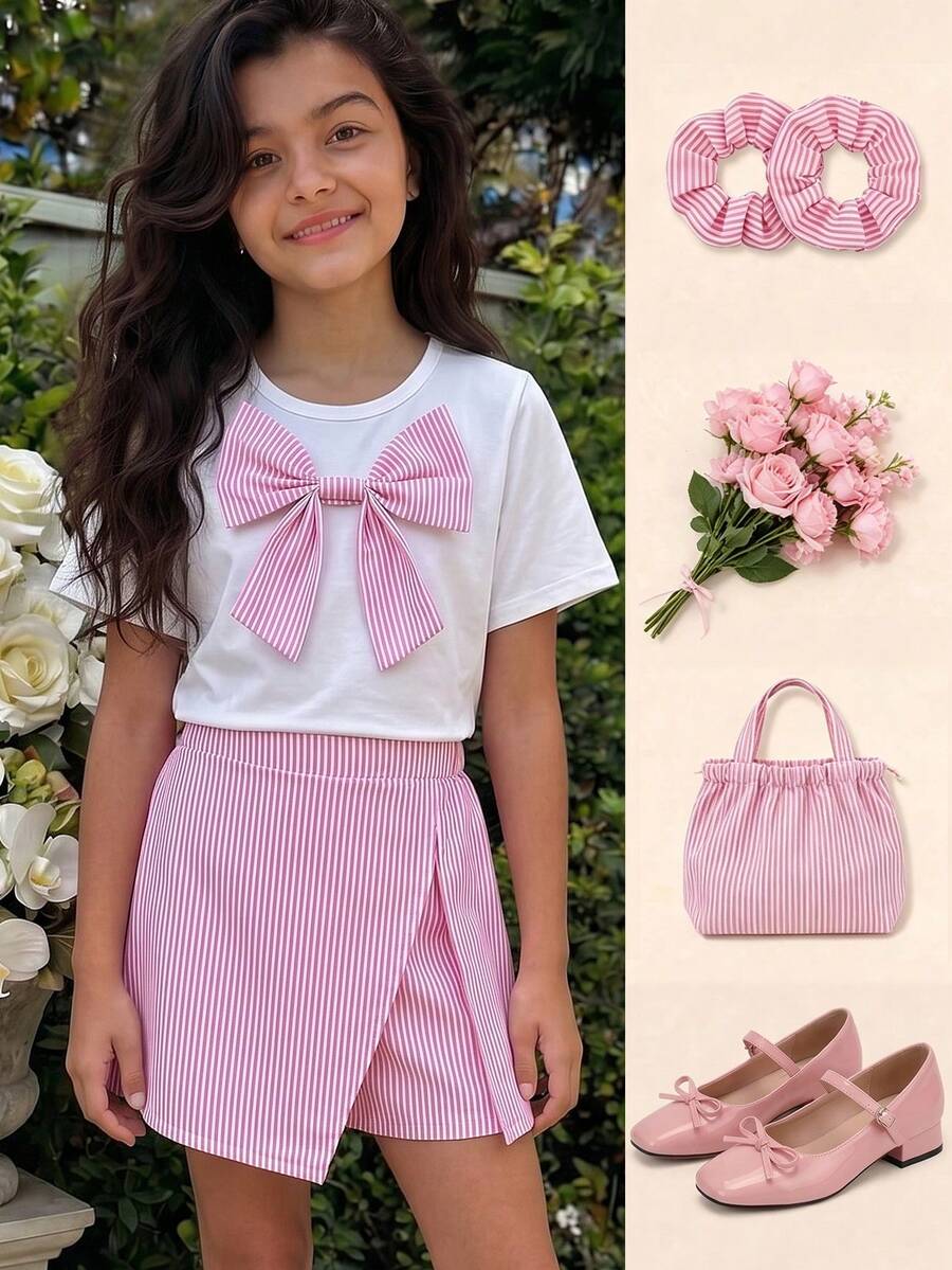 Tween girls 2-piece blue outfit featuring a short sleeve round neck t-shirt with a bow front detail and an asymmetric wrap skort.