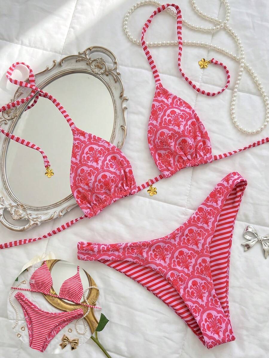 Women's two-piece halter bikini set featuring high cut thong bottoms and removable padding