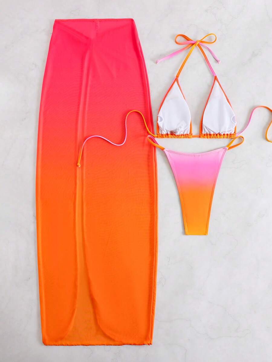 Women's 3-piece floral swimsuit set featuring a multicolor tie-back halter bikini top, low-waist bottoms, and a matching sheer mesh maxi skirt.