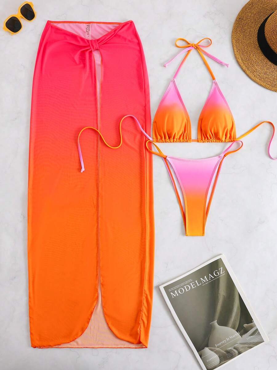 Women's 3-piece floral swimsuit set featuring a multicolor tie-back halter bikini top, low-waist bottoms, and a matching sheer mesh maxi skirt.
