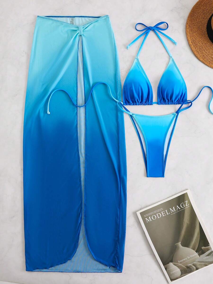 Women's 3-piece floral swimsuit set featuring a multicolor tie-back halter bikini top, low-waist bottoms, and a matching sheer mesh maxi skirt.