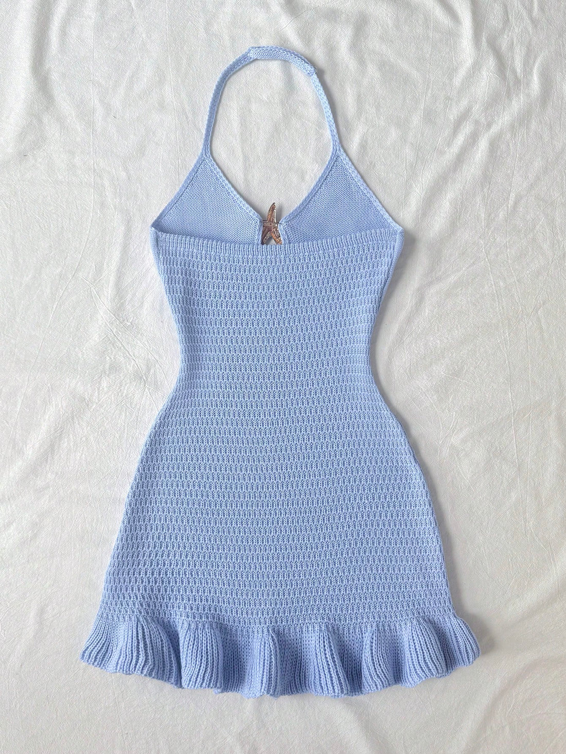 Tween girls long sleeveless halter cover-up dress with ruffle detail, plain fitted design, semi-sheer fabric, and metal starfish decoration.