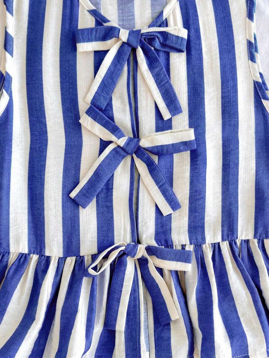 Tween girls green and white striped 2-piece summer set featuring a sleeveless bowknot ruffle crop top and casual shorts.