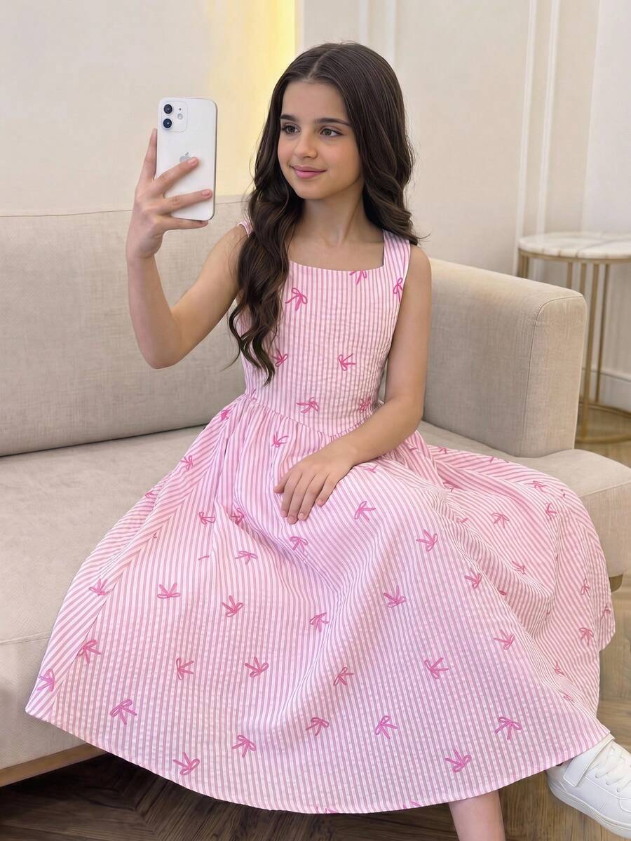 Tween girls pink floral sleeveless A-line midi dress featuring round neck, high waist with belt, contrast lace, and zipper back.