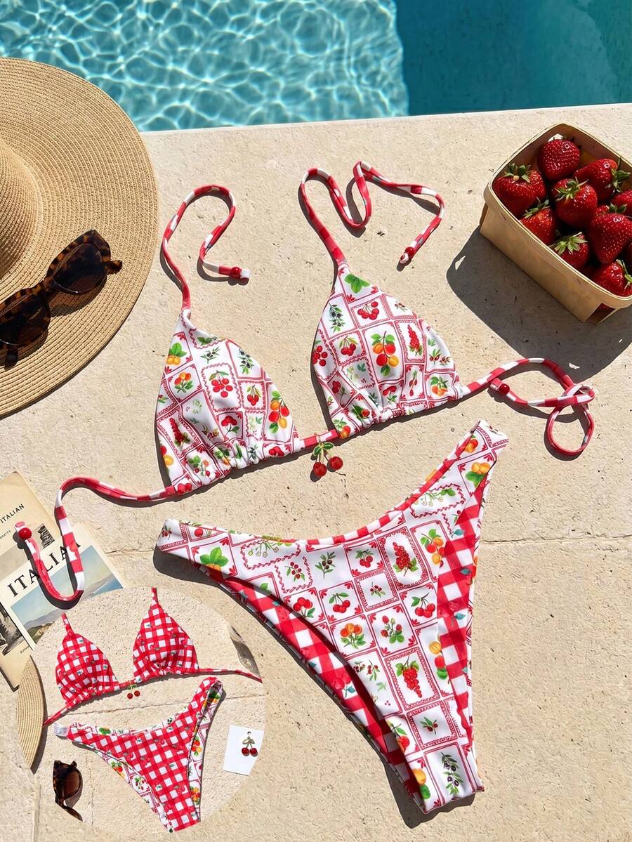 Women's two-piece halter bikini set featuring high cut thong bottoms and removable padding