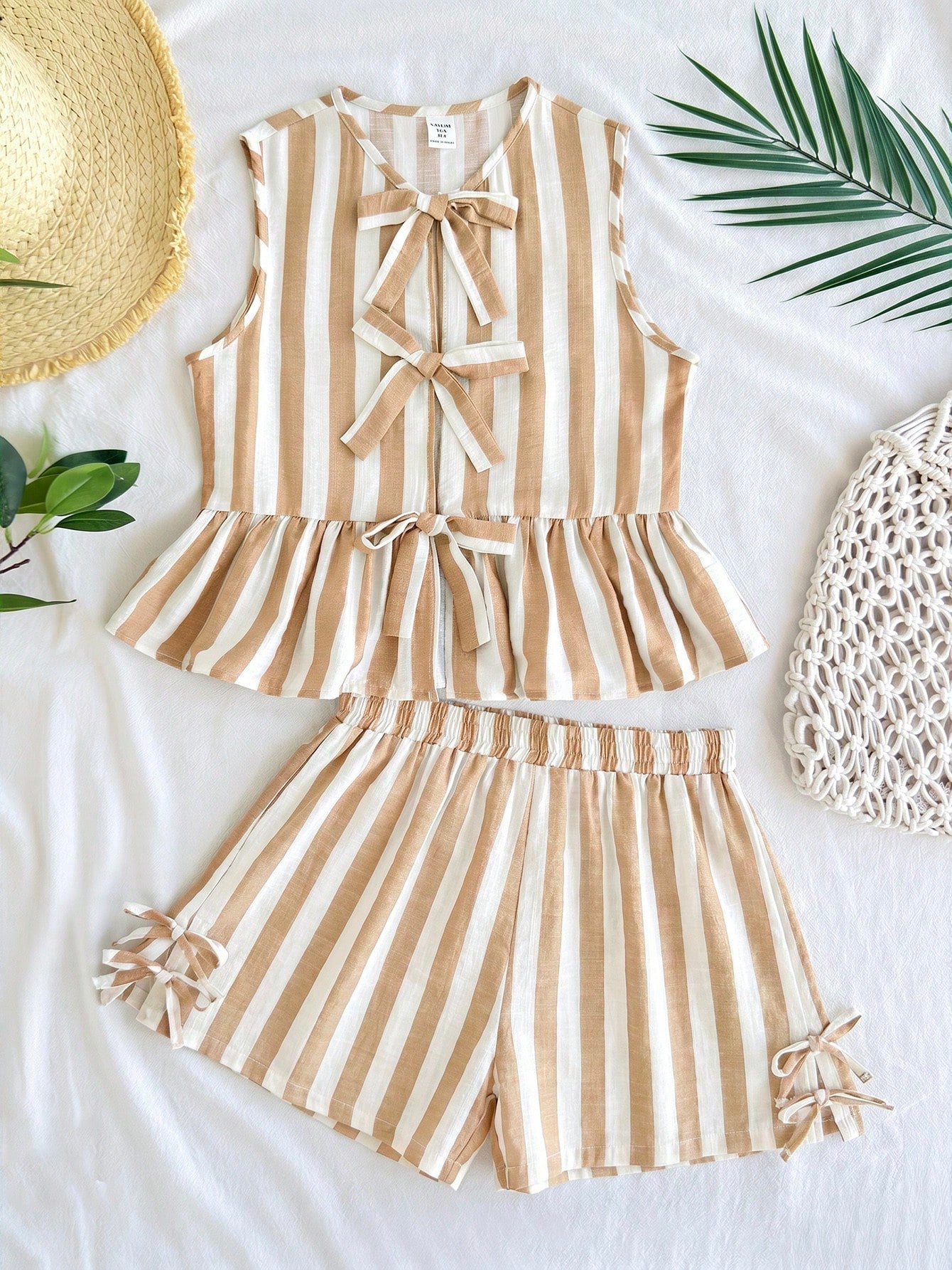 Tween girls green and white striped 2-piece summer set featuring a sleeveless bowknot ruffle crop top and casual shorts.