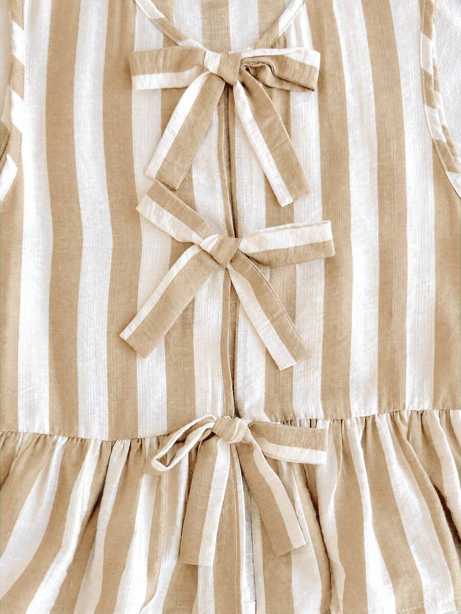 Tween girls green and white striped 2-piece summer set featuring a sleeveless bowknot ruffle crop top and casual shorts.