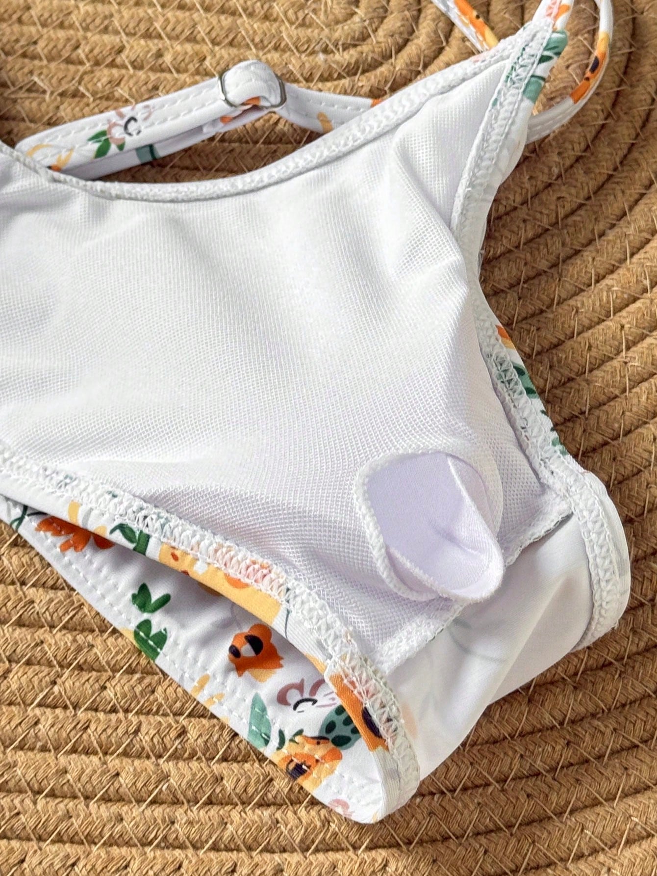 Tween girls green colorblock two-piece bikini set with spaghetti straps, sleeveless wireless top, and lined mid-waist bottoms for beach vacation wear