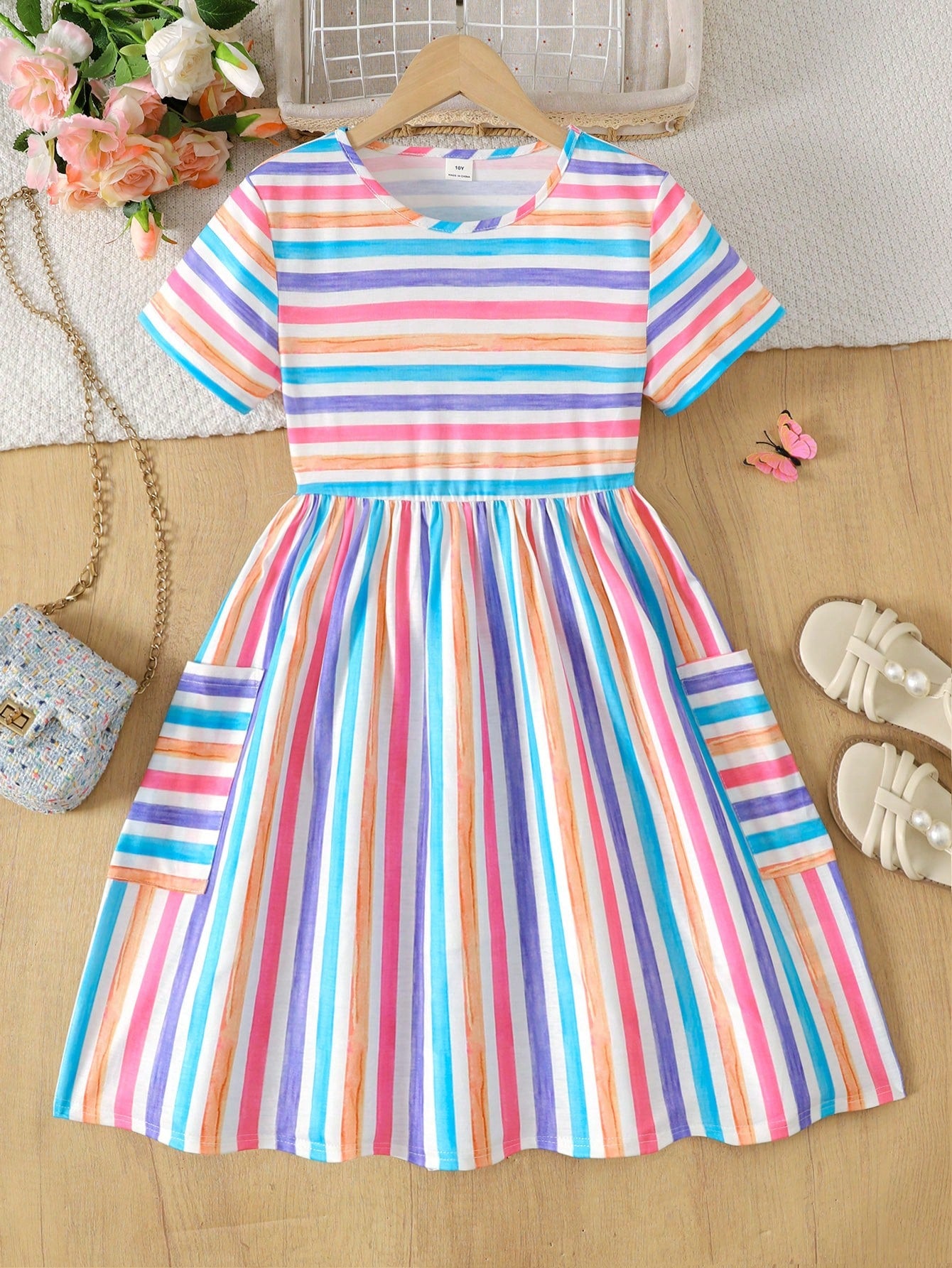 Tween girls casual colorblock short sleeve dress featuring a round neck, high waist flared hem, and button-front details.