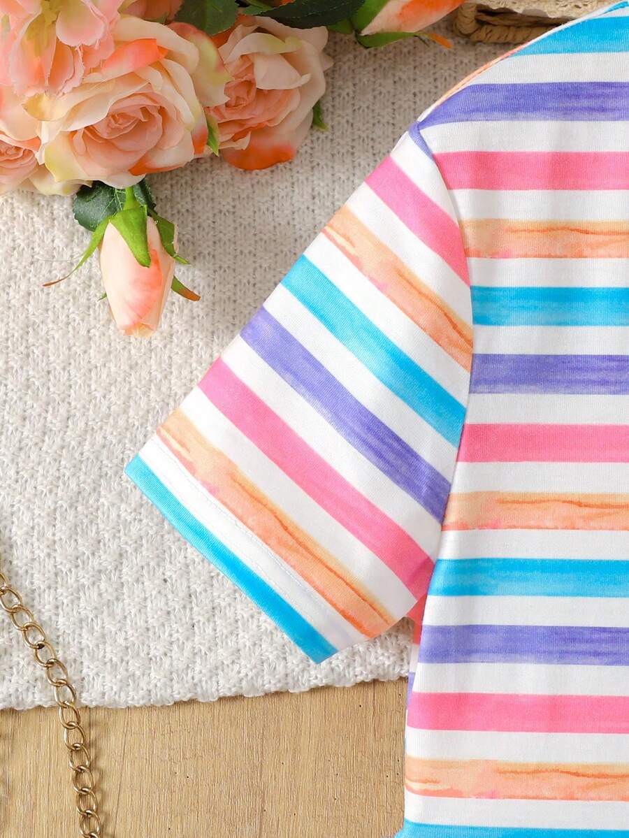 Tween girls casual colorblock short sleeve dress featuring a round neck, high waist flared hem, and button-front details.