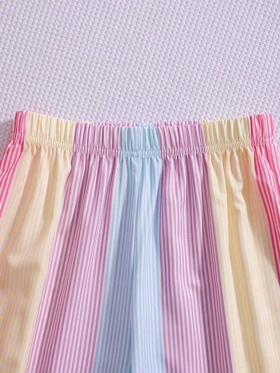 Girls 2-piece summer outfit set featuring a blue bow print camisole top with spaghetti straps and matching high-waisted straight leg pants.