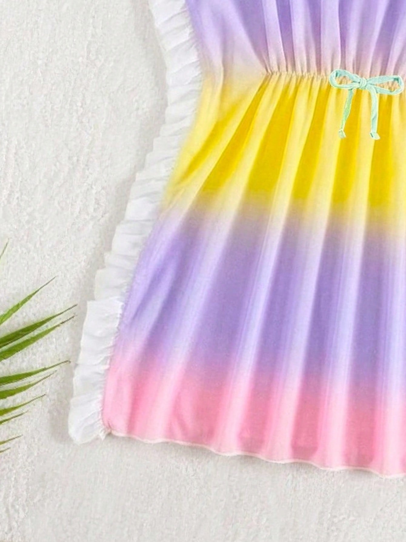 Blue tween girls swimsuit cover up with geometric starfish print, ruffle trim, round neck, short sleeves, and semi-sheer knit fabric for beach or pool wear.