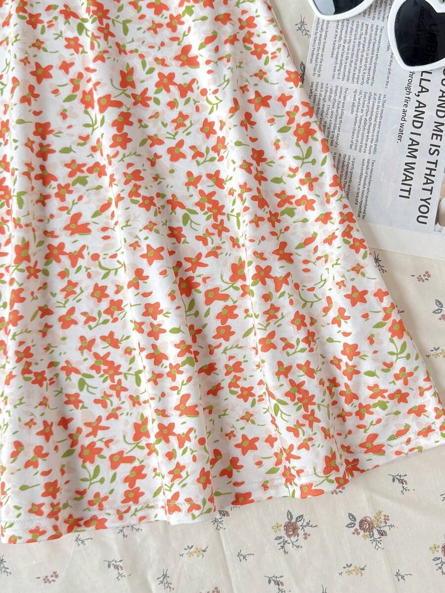 Tween girls' black and white ditsy floral plant print high waist flared camisole dress with a short sleeve t-shirt set.