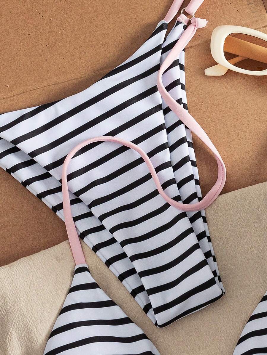 Women's printed halter neck tie two-piece swimwear featuring a wireless triangle top with removable padding and high-waist high-cut bikini bottoms.